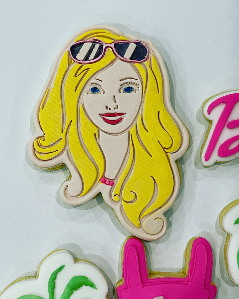 Barbie Cookie with blonde hair and black sunglasses