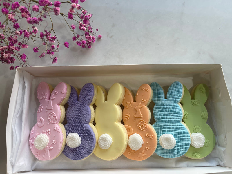 Pink, purple, yellow, oramge, blue and green easter bunny cookies
