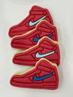 Four Red Nike Shoe Cookies