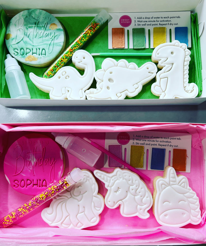 Green blank Dinosaur Cookies and Pink blank Unicorn cookies with Paintbrush and Sprinkles 