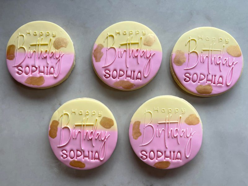 Personalised Cookies in Pink and Yellow saying Happy Birthday