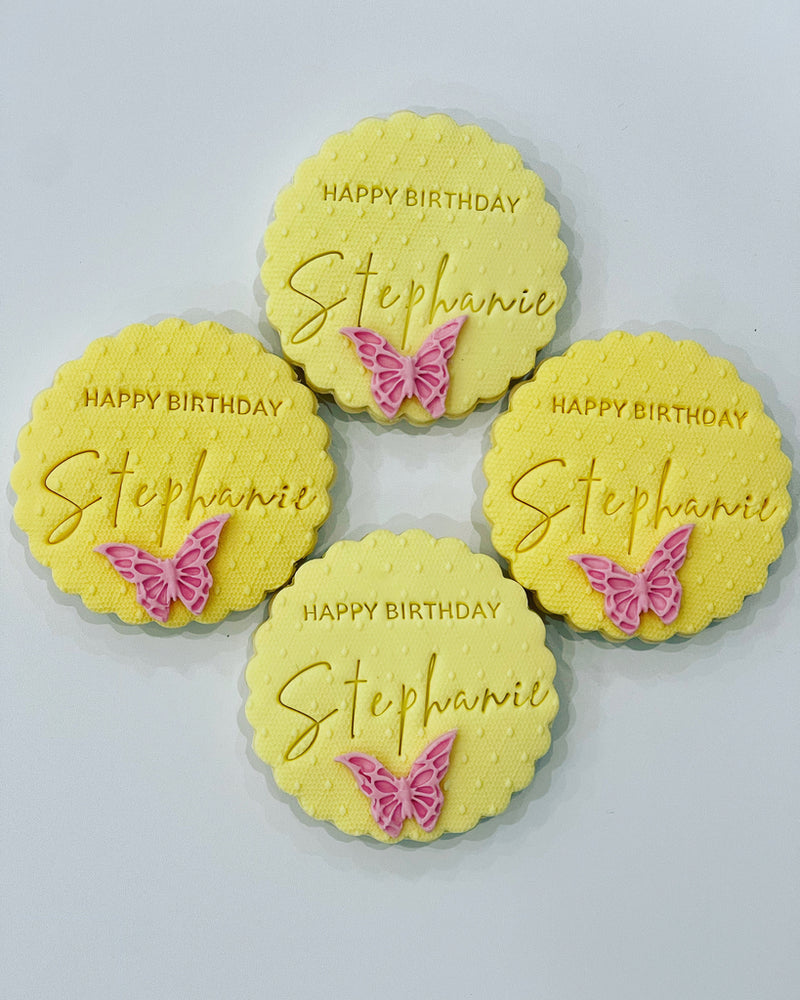 Yellow Personalised Fondant Cookies with Happy Birthday and a pink butterfly 